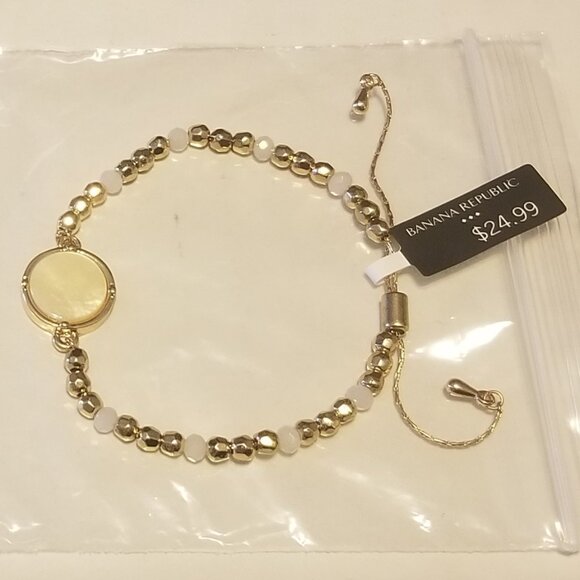 Banana Republic Jewelry - Banana Republic goldtone and white beaded bracelet